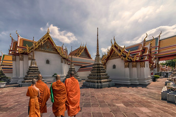 Monks in Wat Pho temple in Bangkok, Thailand