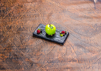 Apple confit with white chocolate mousse and almond barbecue