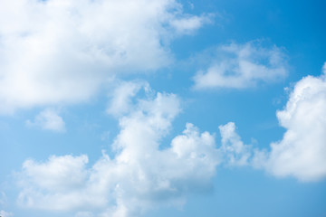 Nature Bright blue Sky with white clouds on blackground. Beautiful sky and clouds in the afternoon.