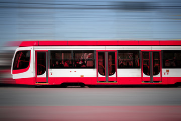 the motion blur of the public city tram or train