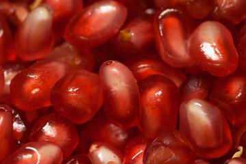 Garnet little seeds red macro for bright background above view