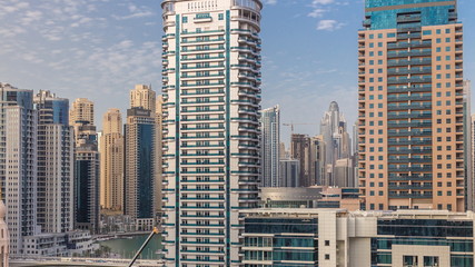 Dubai Marina skyscrapers, port with luxury yachts and Marina promenade aerial timelapse, Dubai, United Arab Emirates