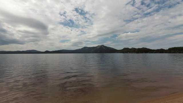 The lake near the mountains, rocks and trees in Borovoe, Kazakhstan