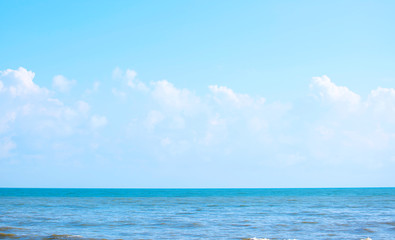 The sea in the dark blue sky on the day of bright