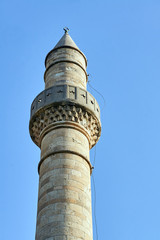Historic Turkish minaret in city of Kos in Greece.