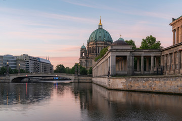 Fototapeta na wymiar Berlin Cathedral (Berliner Dom) reflected in Spree River at dawn, Germany