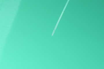 white line from an airplane on the sky.