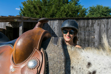 A woman with a horse