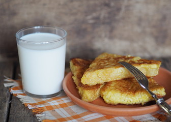 fried toasts on a wooden rustic table background