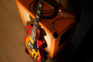 Guitar amplifier with guitar plug and cable