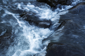 abstract detail of wild river flow