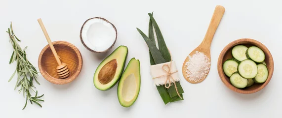 Fototapeten Natural herbal skin care products, ingredients aloe, avocado © Prostock-studio