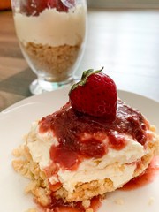 cake with whipped cream and strawberries