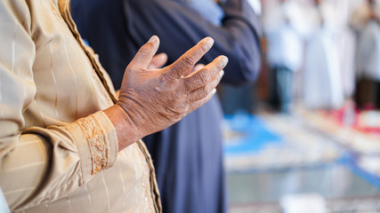 Close up Muslims are praying