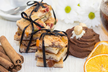 Dessert from a baking dish on tables in a restaurant is shot close-up