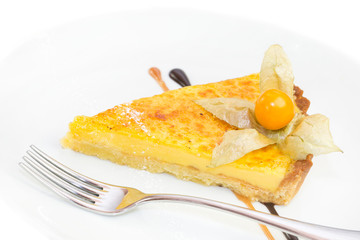 Dessert from a baking dish on tables in a restaurant is shot close-up