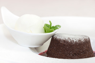 Dessert from a baking dish on tables in a restaurant is shot close-up