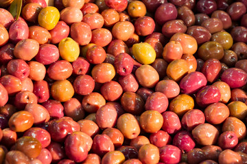 Background close-up shot of olives on the eastern market 