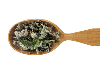 Dry white mint in a wooden spoon on a white background