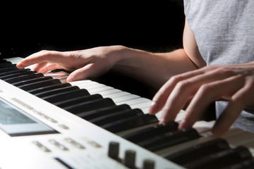 Fototapeta premium Pianist musician piano musical instrument playing. Music piano with man performer.