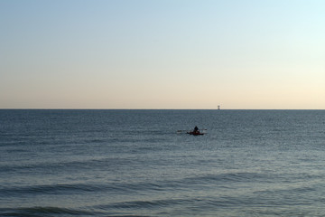 Fototapeta premium fishing in sea,horizon,sky,view,calm,water,seaside,