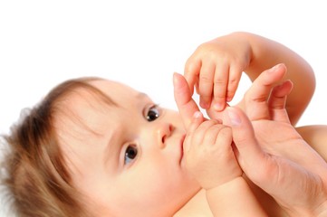 Child holding palm mother with hands
