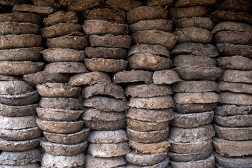 A bunch of blanks for heating the house is made of manure from cows and animals. The original name 