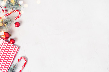 Christmas or New Year background with festive red decoration and Christmas lights