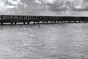 old wooden pier goes to sea