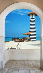 wooden open door arch exit to the beach caribbean dominican republic
