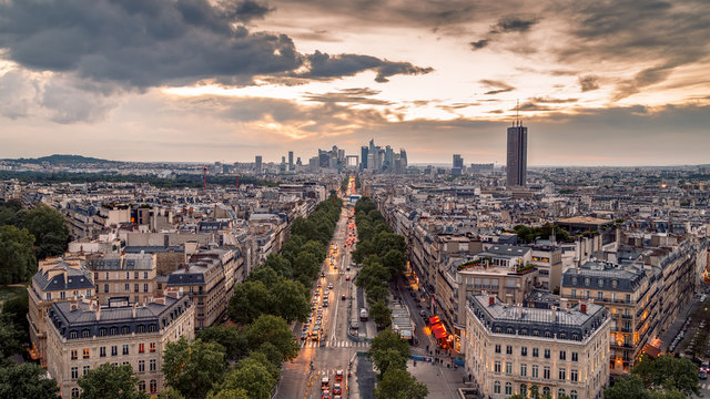 Aerial panoramic sunset view of Paris, France. Cityscape from the top of Triumph Arch. 
