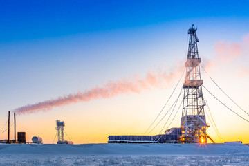 Winter polar day in the arctic. Drilling a well at a northern oil and gas field. Low sun. Beautiful...