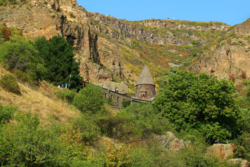Fototapeta na wymiar Geghard Monastery, medieval monastery complex partially cut directly into the mountain rock, Kotayk province, Armenia