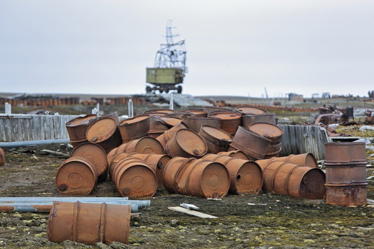 Rusty fuel and chemical drums in the Arctic