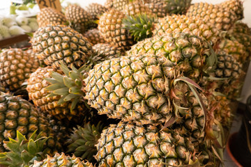 pineapple fruit at traditional marketplace