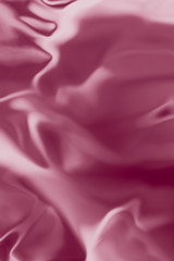 . Pink liquid shiny background.