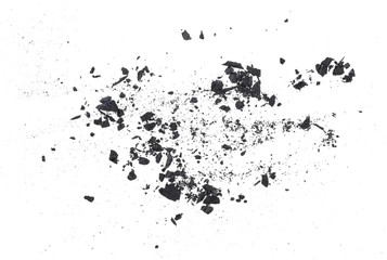 Charcoal dust with fragments isolated on white background, top view.