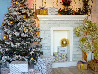 Beautiful Christmas interior with fireplace and garlands.