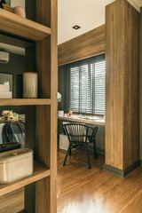 Writing table with chair by the window..