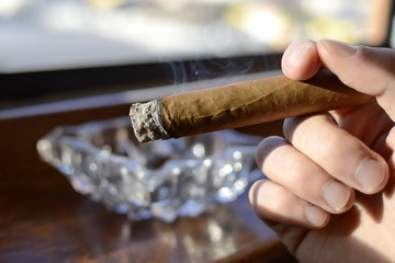cigar in hand