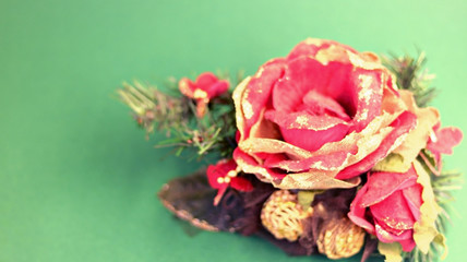  Christmas card with holiday decoration, on a green background. Christmas template for banner, ticket, brochure, card, invitation, poster, etc. Place for text.