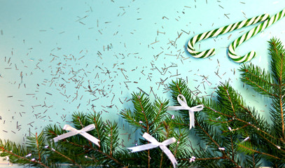 New Year card with Christmas and holiday decorations, sweets, on a blue background. Christmas template for banner, ticket, brochure, card, invitation, poster, etc. Place for text.