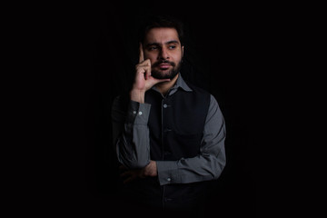 A Young Man Thinking in Darkness