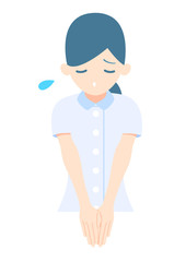 謝罪をする女性看護士_ポーズ9