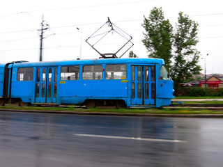 Fototapeta na wymiar Sarajevo, Bosnia and Herzegovina blue tram in motion