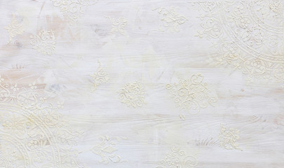 background of white wooden vintage wall with floral emboss details