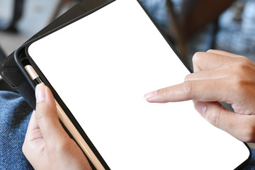 People play tablet. Finger scrolling feed on tablet screen 