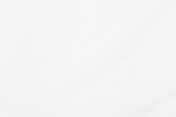 White fabric texture background with soft waves.