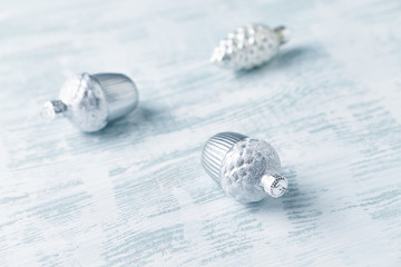 Christmas baubles on bright wooden background. Close up. 