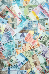 Fototapeta na wymiar Money from around the world, various currencies